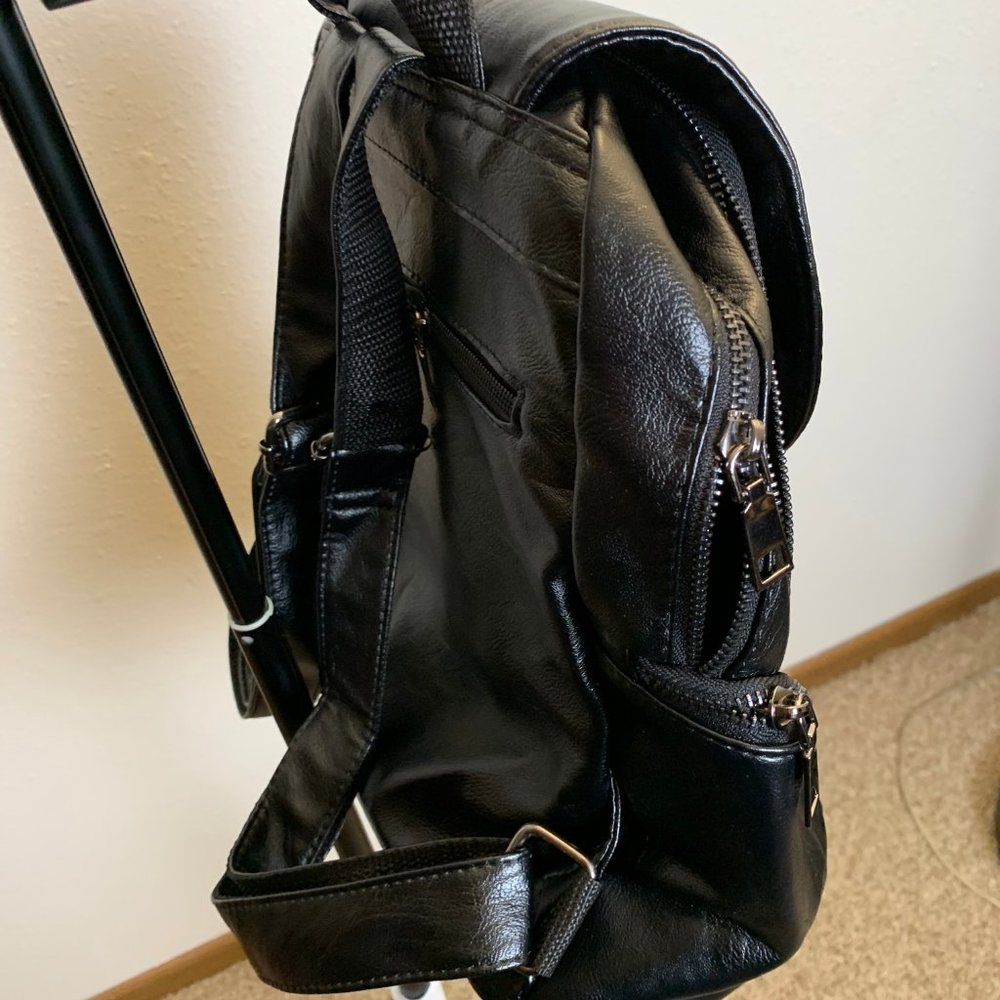 Black Genuine Leather Backpack Never Used